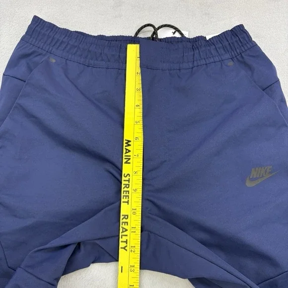 Nike Pants Mens Small Navy Sportswear Tech Essentials Commuter Woven Tapered Zip